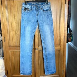 Antique Rivet light wash jeans with leather detailing